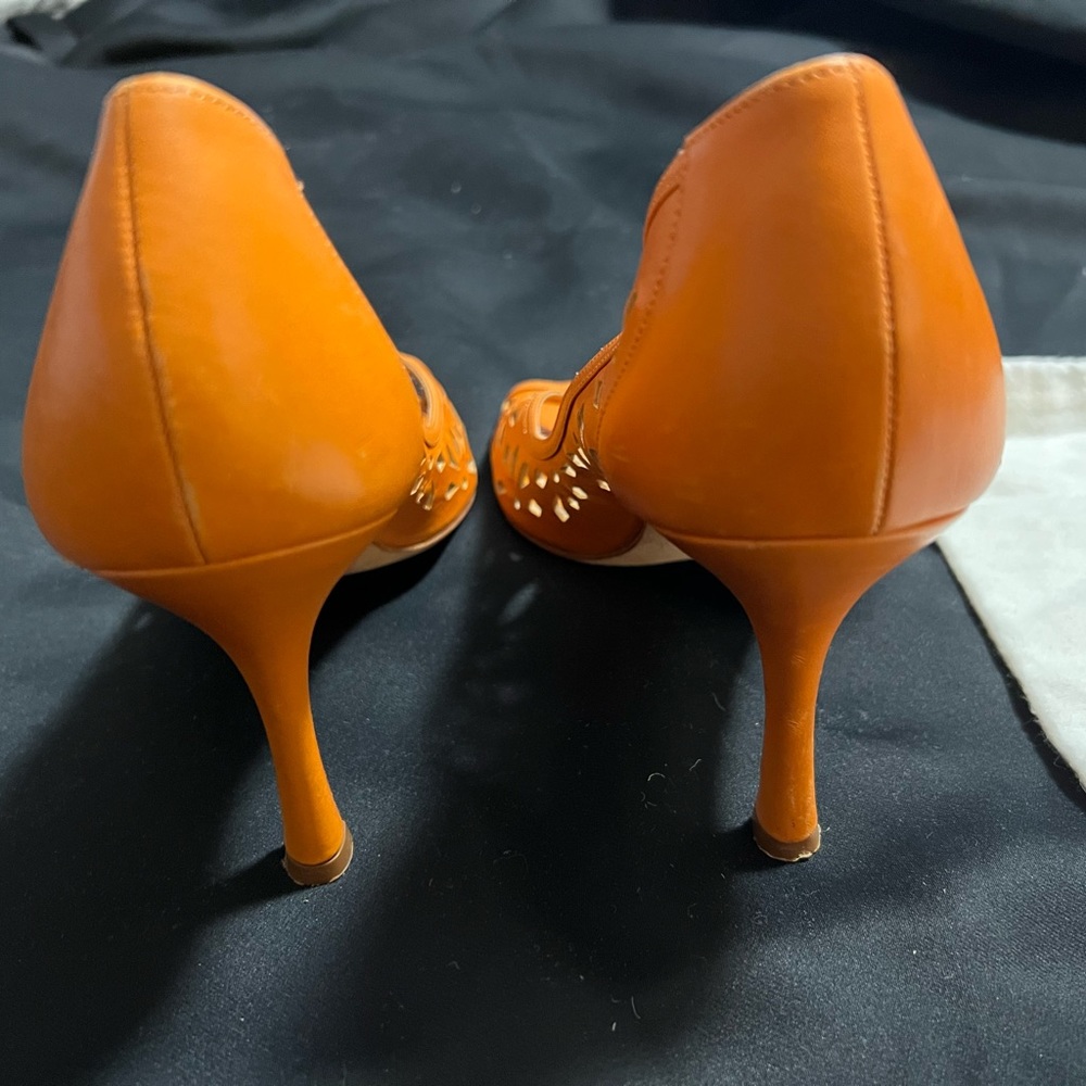 Orange authentic Manolo Blahnik heels with cloth bag